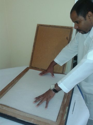 Colocação de uma proteção na parte de trás do quadro 